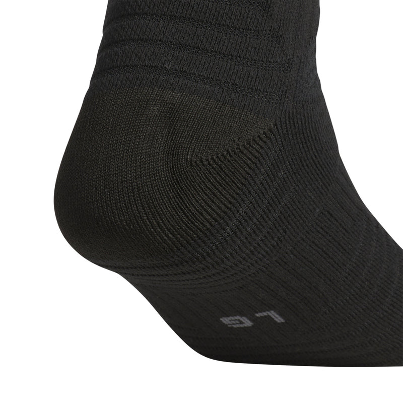 Black slouch crew sock with textured arch knit and three white stripes