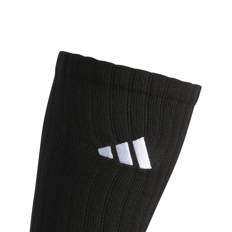 Black slouch crew sock cuff with ribbed band and three white stripes logo