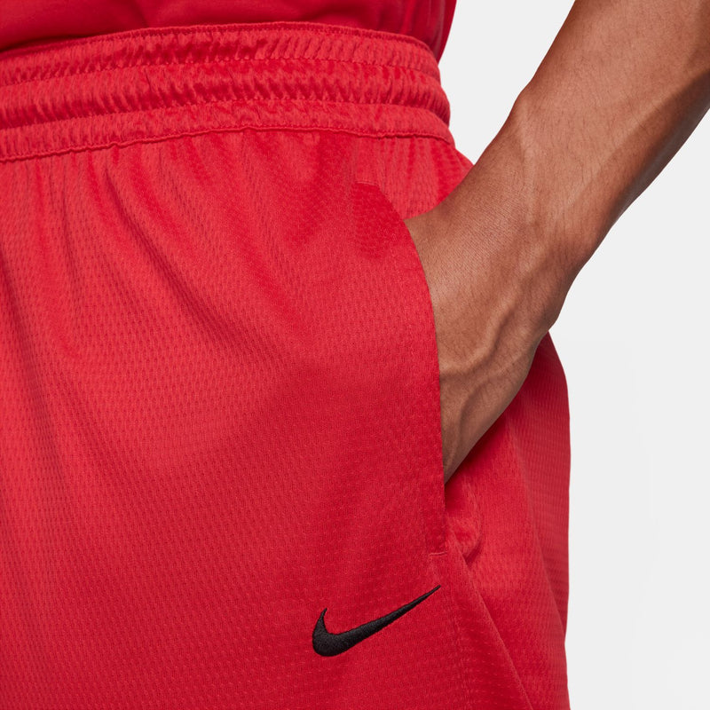 Men's university red shorts detail of slanted pocket seam and Nike swoosh