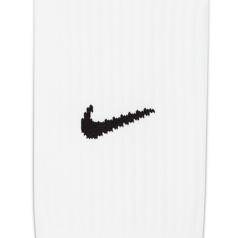 Nike Academy OTC soccer socks, close-up of black Nike Swoosh on white