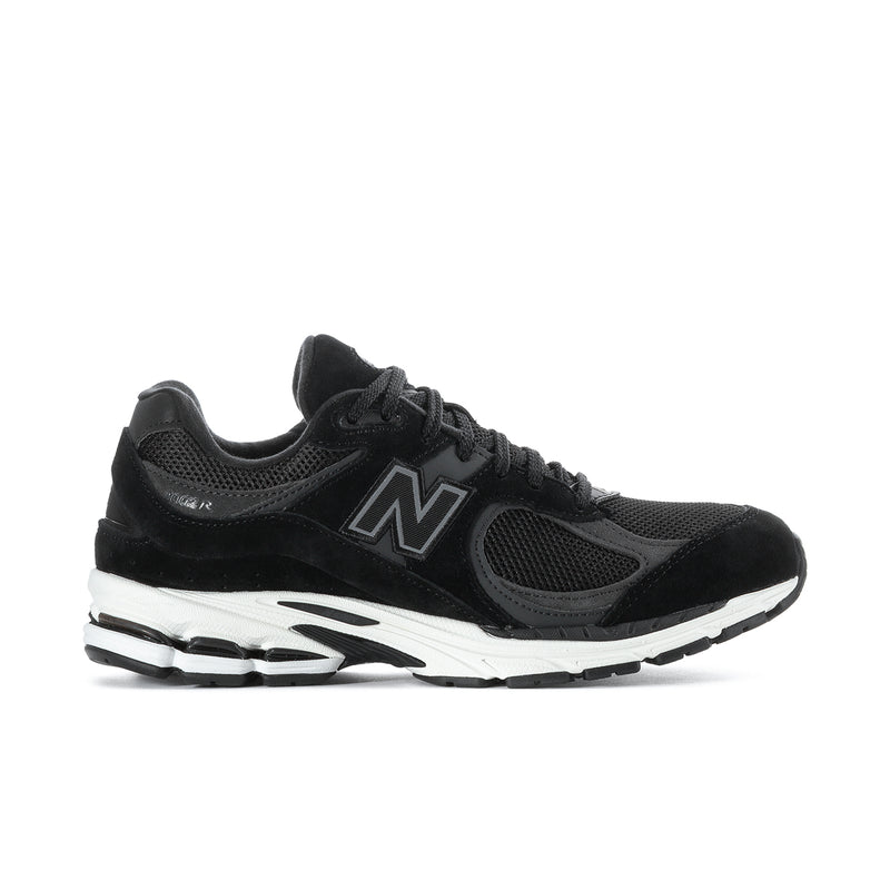Men's black running sneaker with N logo, mesh upper, white midsole and outsole