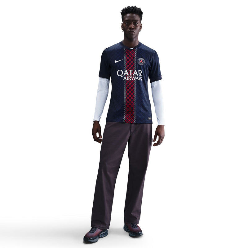 Men's PSG stadium home jersey front, navy with red vertical stripe and QATAR AIRWAYS