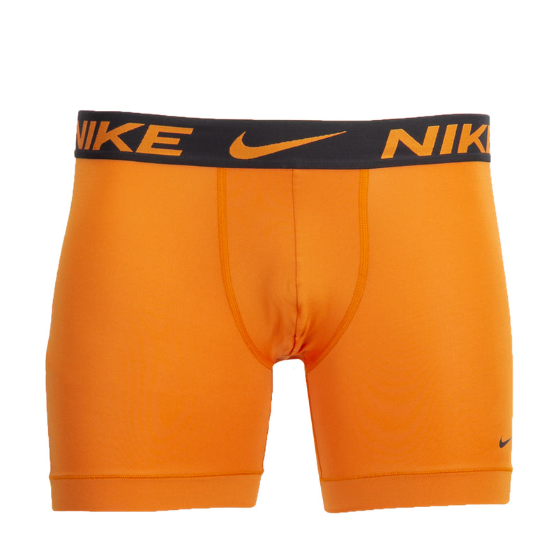 Men's orange boxer briefs with NIKE logo waistband and side swoosh