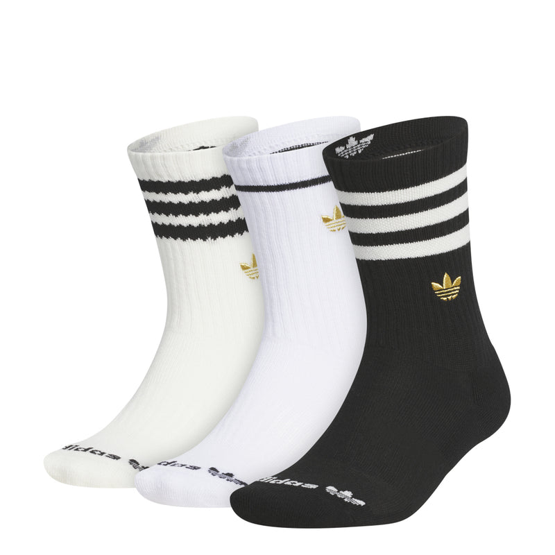 3-pack crew socks with striped bands and gold logo accents on black and white pairs