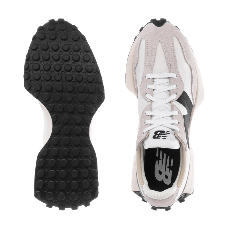 Women's sneaker outsole and back view with black textured tread