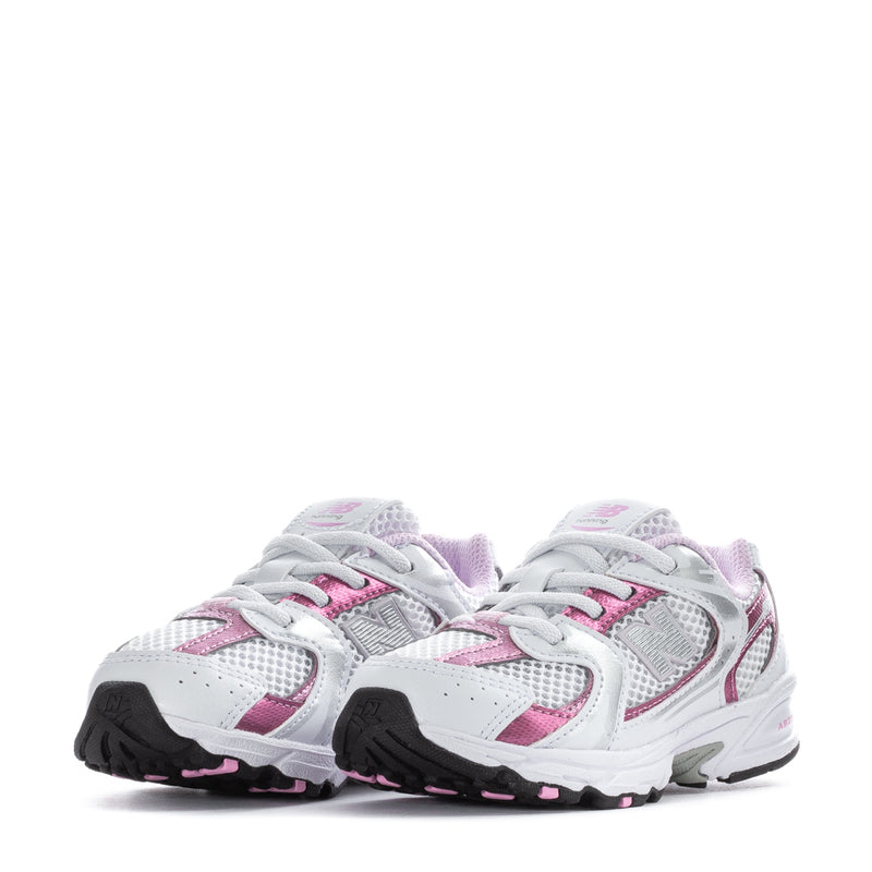 Toddler sneakers pair, white with pink trim, lace-up sport design