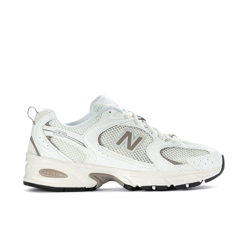 New Balance 530 wide women's sneakers in off-white mesh with N logo and rubber sole