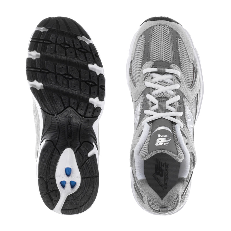 Women's wide sneaker outsole pair: black tread bottom and gray shoe underside