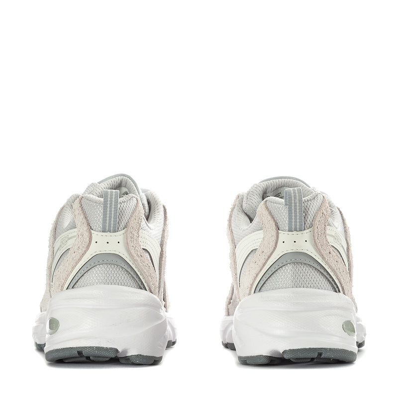 Wide women’s sneakers heel view in light beige with grey mesh and cushioned collar