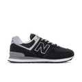 Men's New Balance 574 extra-wide sneakers in black with white accents, lace-up.