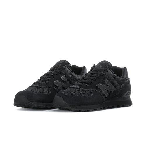 Men's New Balance 574 sneakers, black pair with layered panels and lace-up uppers.