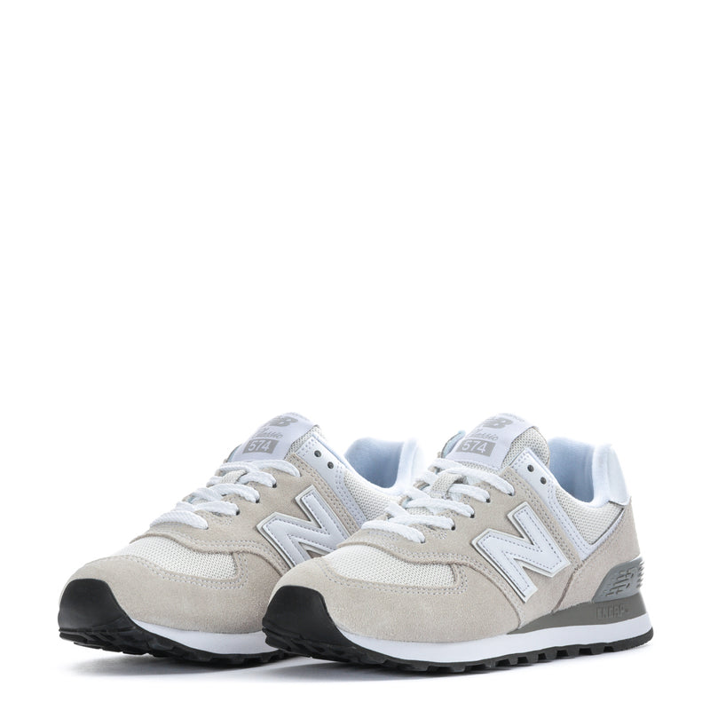 Women's New Balance 574 wide sneakers in Nimbus Cloud and white, lace-up.