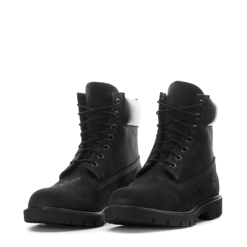 Men's black lace-up work boots pair with padded collars and thick platform sole