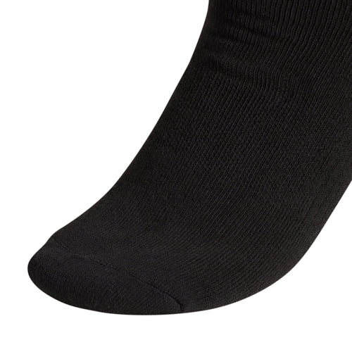 Black crew sock close-up showing ribbed knit and smooth toe