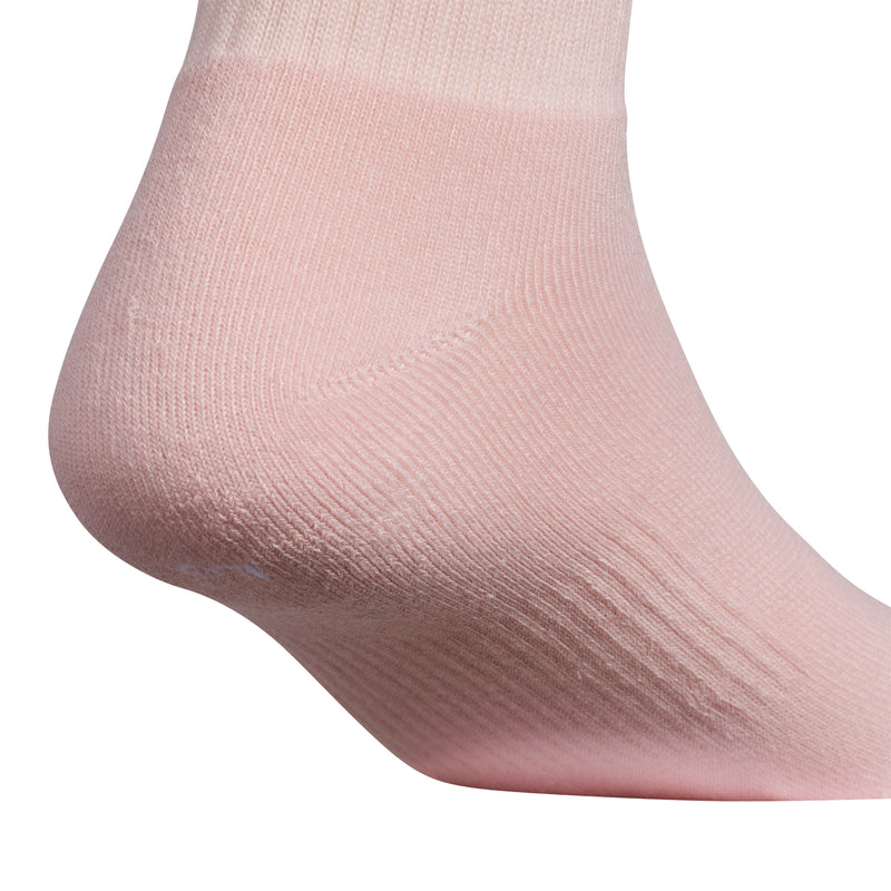 Medium quarter crew socks in sandy pink, closeup of ribbed toe and heel