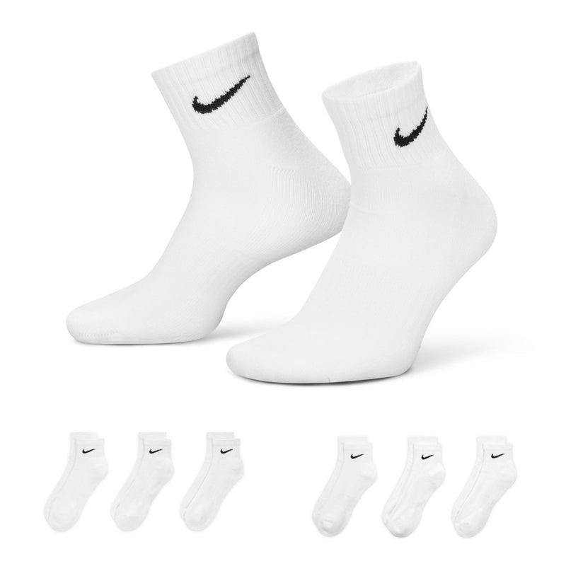 White cushioned quarter crew socks with black Nike swoosh logo, pair shown
