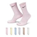 Light pink crew socks with Nike swoosh, cushioned sole and ribbed cuff (pair).