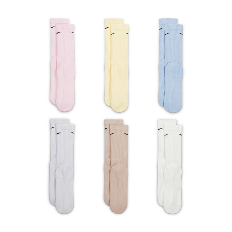 Six-pack crew socks in pastel tones, with black Nike swoosh logos on the cuffs.