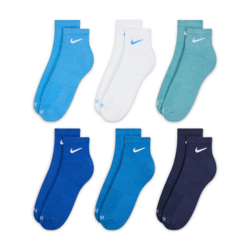 Six-pack quarter socks in blue, teal, white, and navy with white Nike swooshes