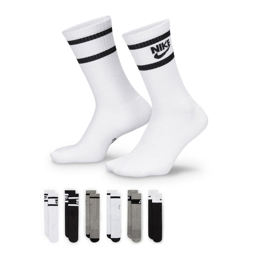 Youth crew socks: white pairs with black striped cuffs and NIKE logo
