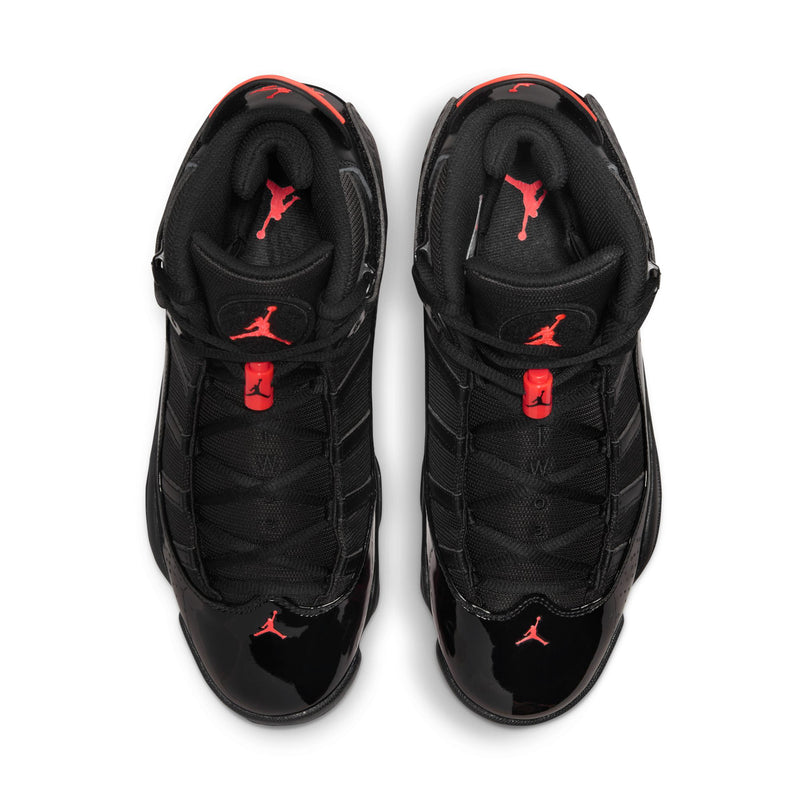 Men's black high-top sneakers with red Jumpman logo on the tongue