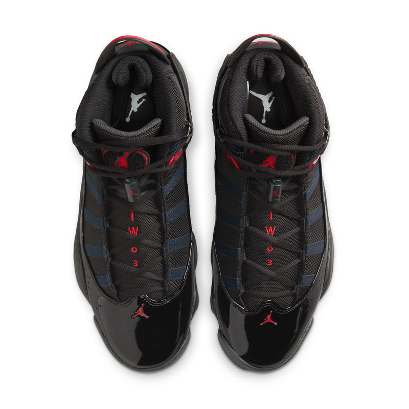 Pair of men's high-top sneakers with black interior lining and red logo accents
