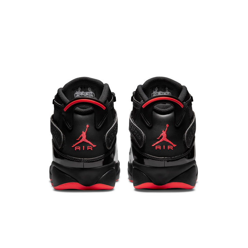 Men's black high-top sneakers with red Air logo on the back