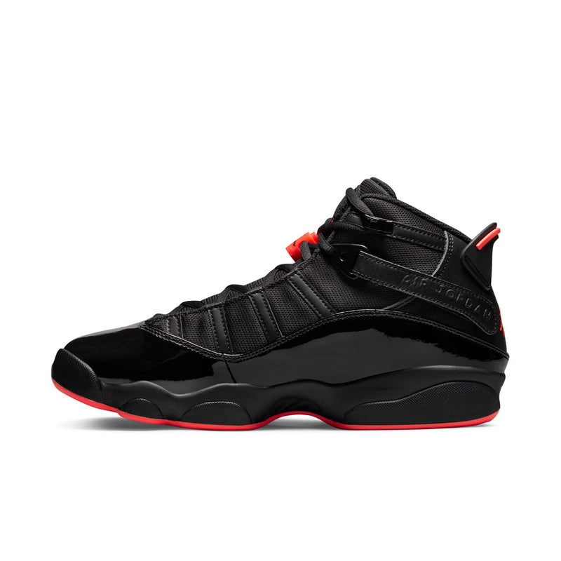 Men's black high-top sneakers with hook-and-loop straps and red detailing