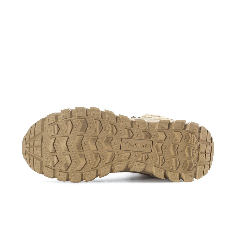 Men's tan boot outsole with thick chevron tread for grip