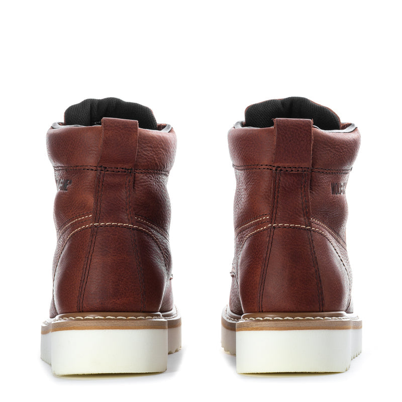 Men's rust work wedge boots heel view with stitched panels and padded back collar