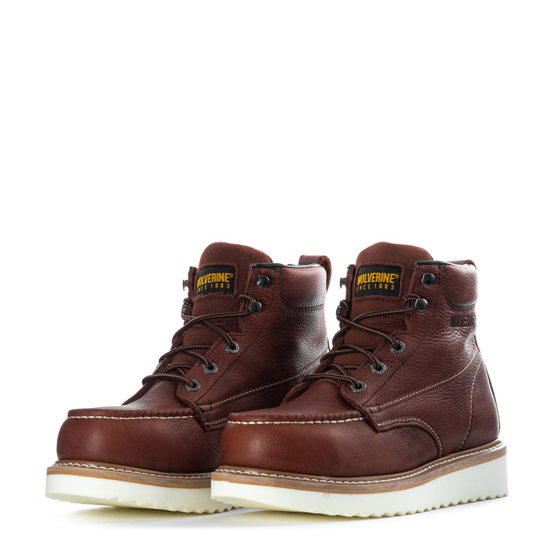 Pair of Wolverine men’s rust-brown leather steel-toe work boots with lace-up wedge soles