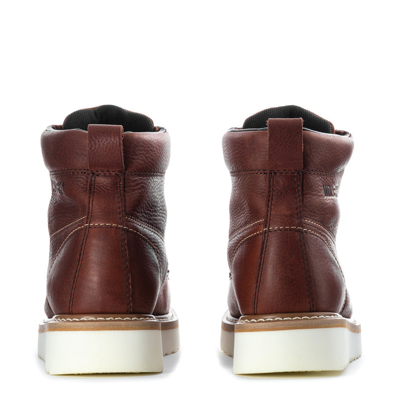Wolverine men’s rust-brown leather work boots, heel view, lace-up wedge soles