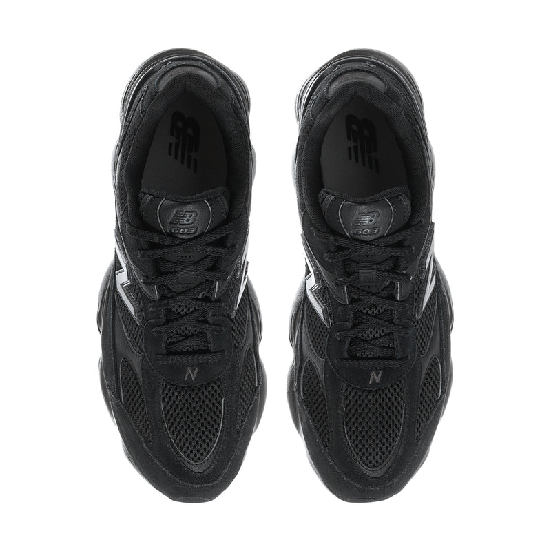 Black lace-up athletic sneakers, top view with textured mesh and N logo