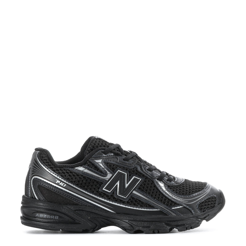 Kids running shoes in black with silver N logo and cushioned sole
