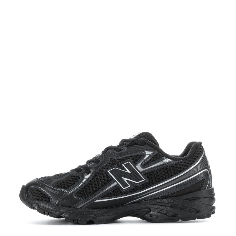 Kids running shoes, black mesh upper with silver N logo and lace-up front