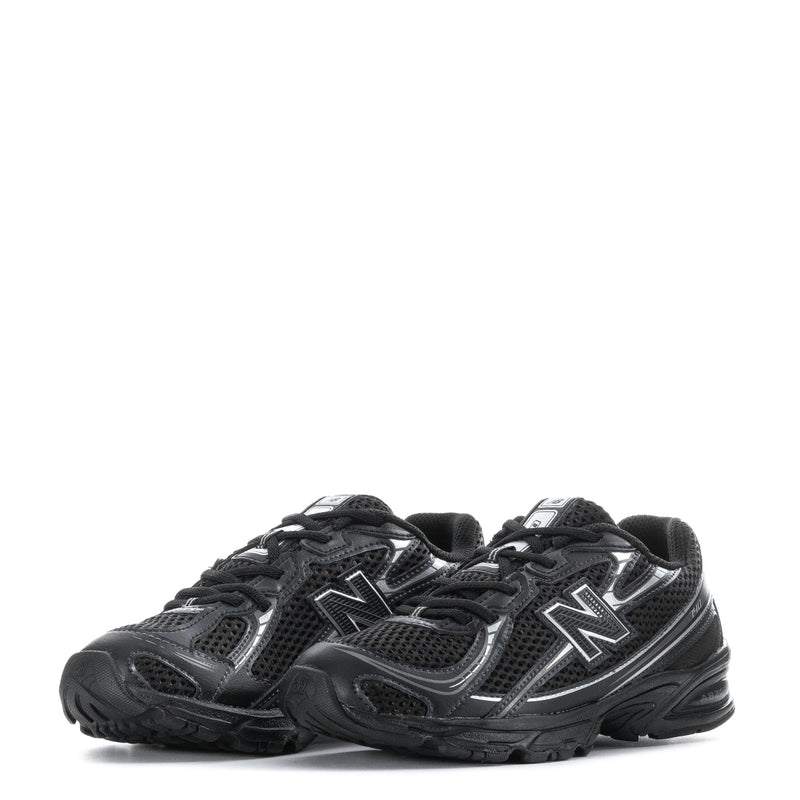 Kids running shoes, black and silver, two N logos with textured rubber outsole