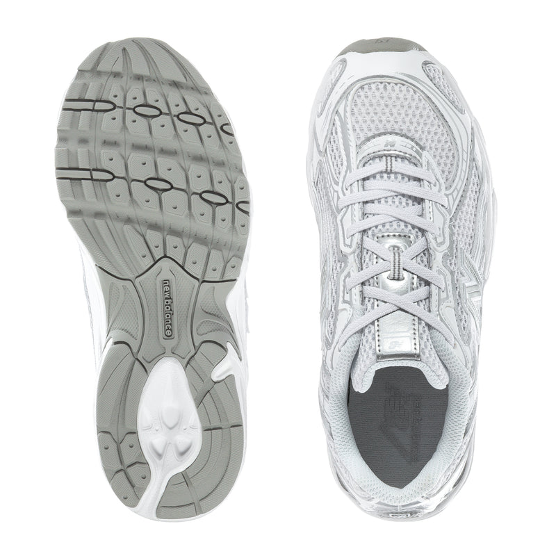 Kids running sneakers, white outsole with rear view and textured traction