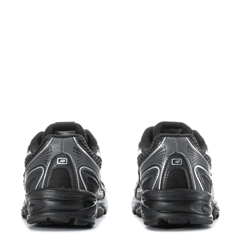 Kids running shoes heel view, black with silver overlays and lace-up back tab