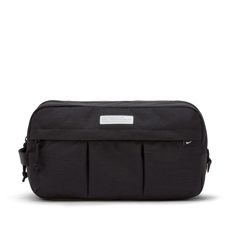 Black soccer shoe bag with top label, front panel seams, and side handles