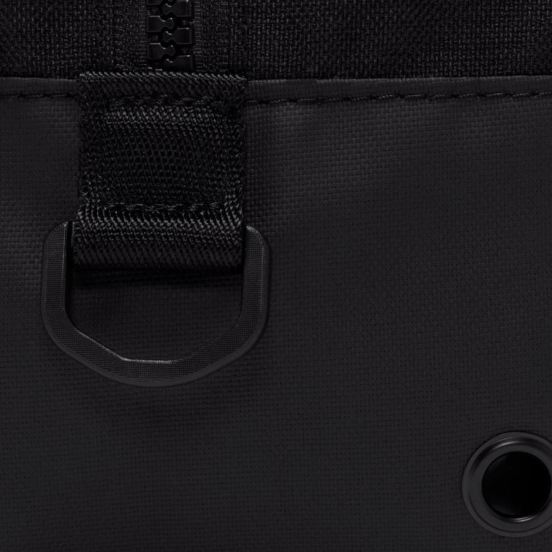 Black soccer shoe bag close-up with pull tab, zipper track, and round grommet
