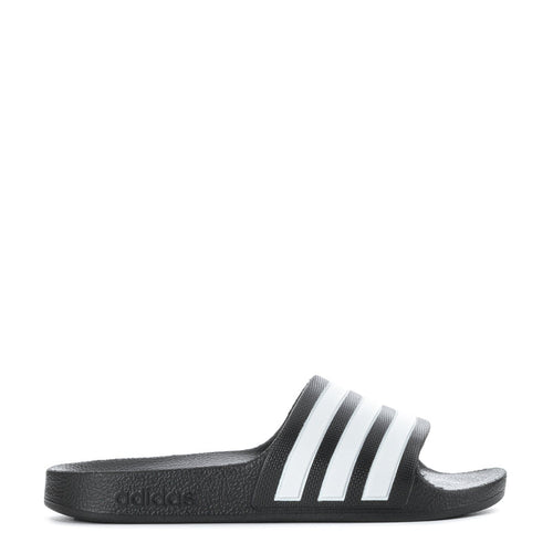 Kids black slide sandals with white triple stripes and molded footbed