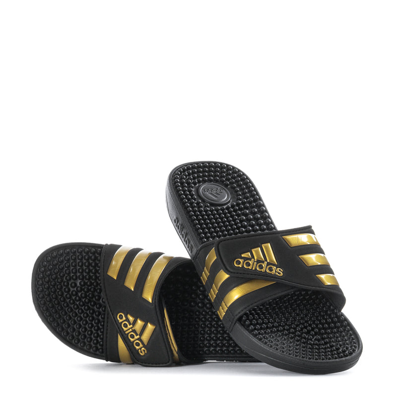 Men's black slide sandals with gold-striped straps and textured molded footbed