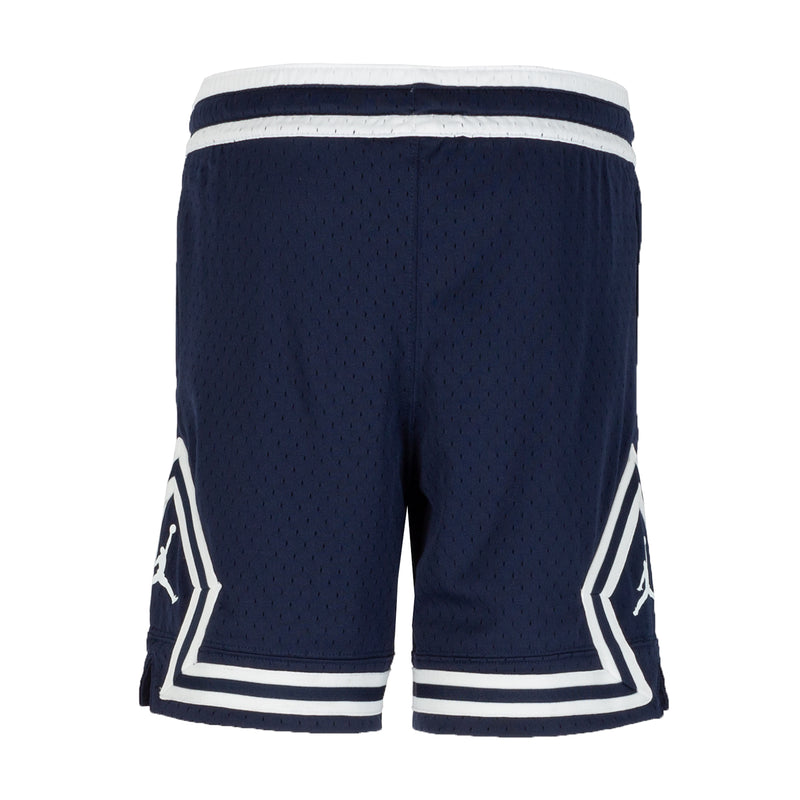 Youth navy athletic shorts with white striped cuffs and large geometric Jumpman panels