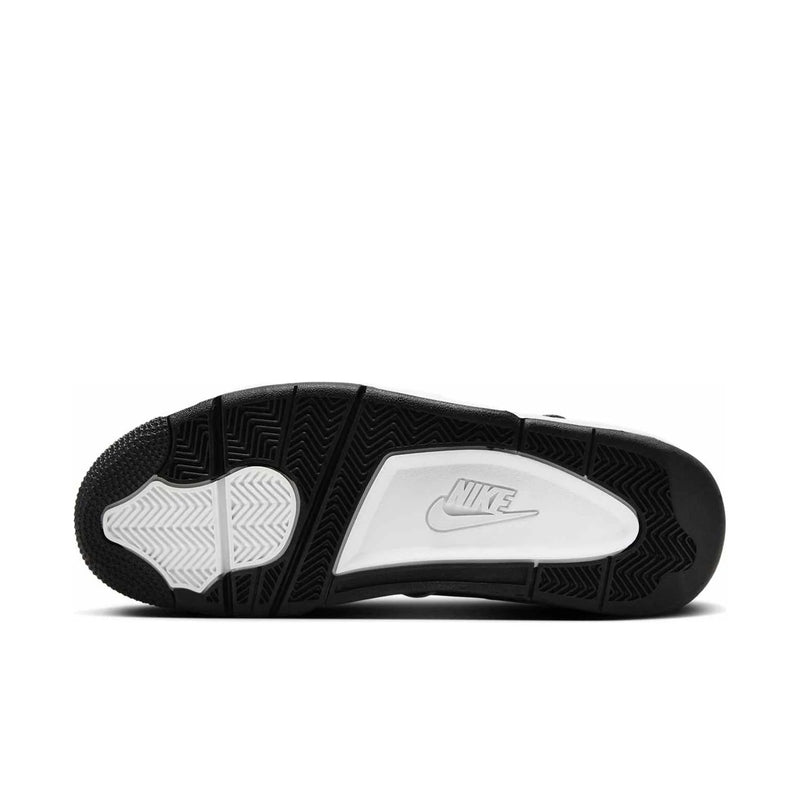 Shoe outsole for black Air sneakers with textured traction and white logo panel
