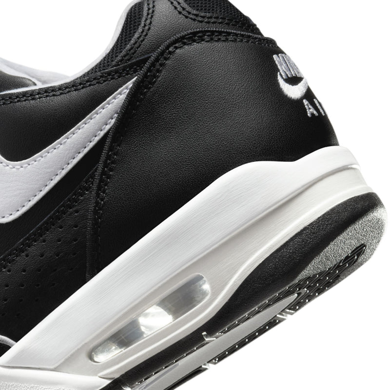 Black Air sneaker side close-up with white midsole and visible Air cushioning window