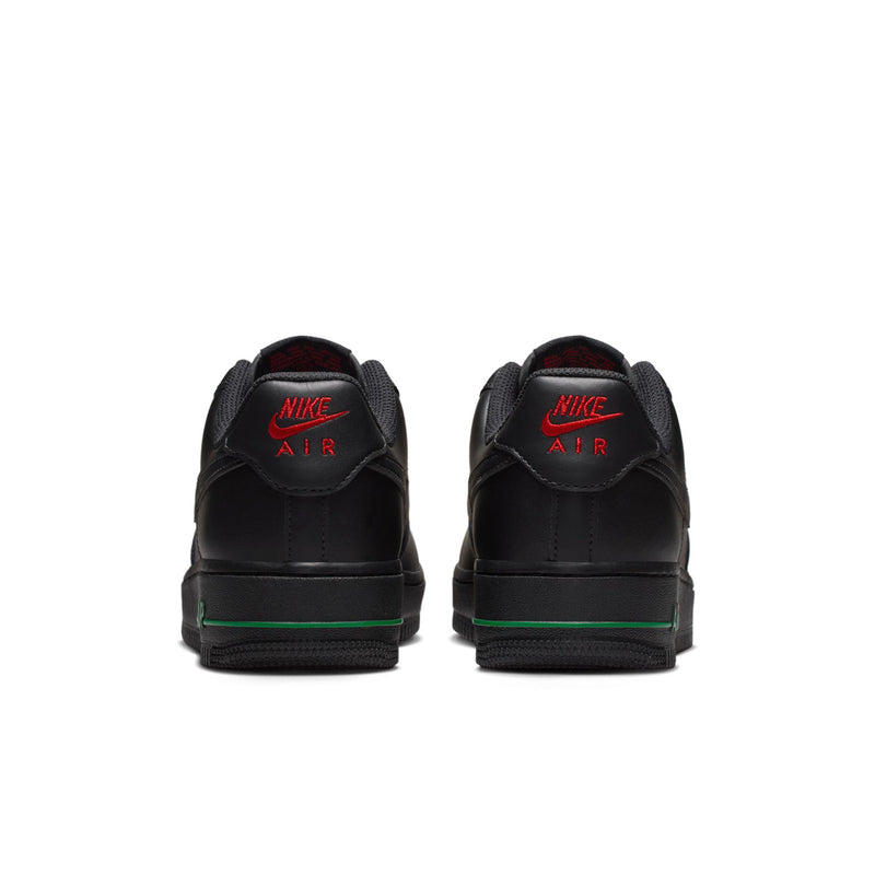 Womens Nike Air Force 1 heel view, black leather with Nike Air branding and green trim
