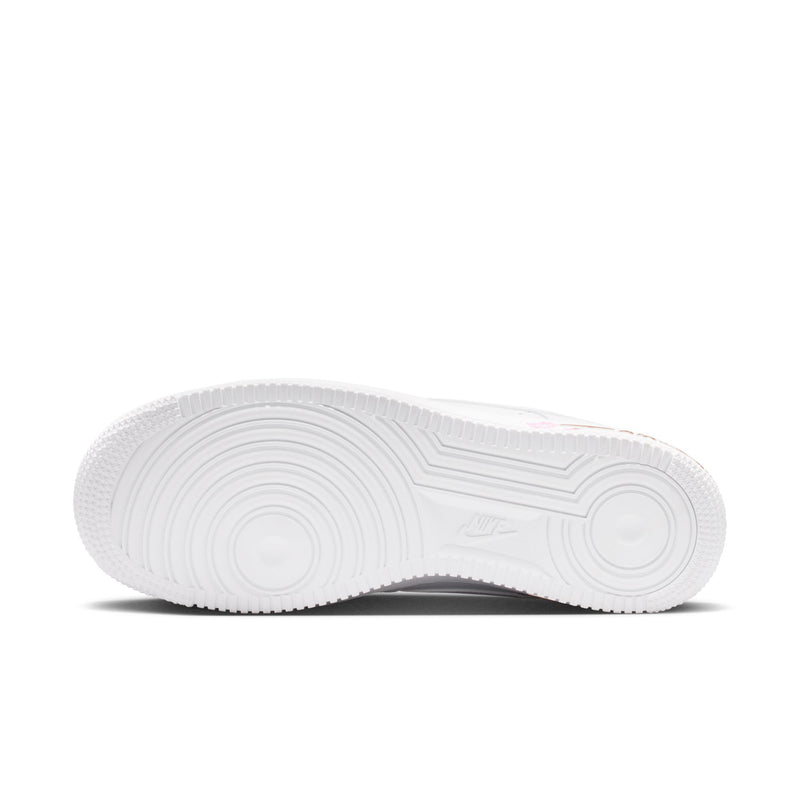 White rubber outsole with textured traction pattern and Nike logo