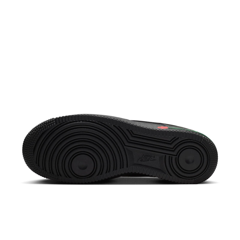 Womens Nike Air Force 1 outsole, textured black rubber with raised circular tread pattern