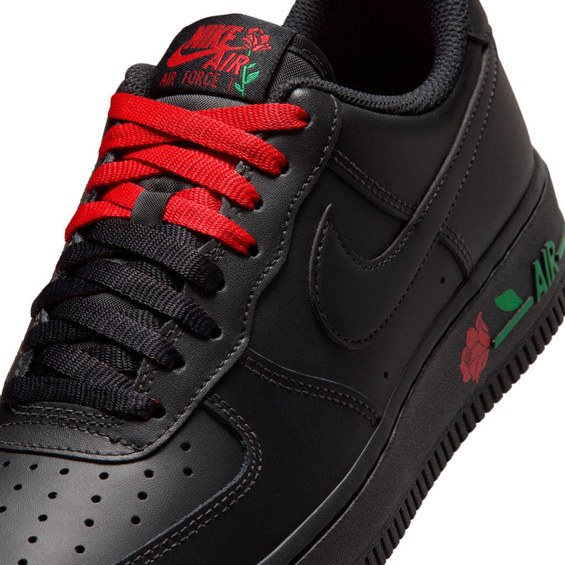 Womens Nike Air Force 1 upper close-up, black leather with red laces and swoosh