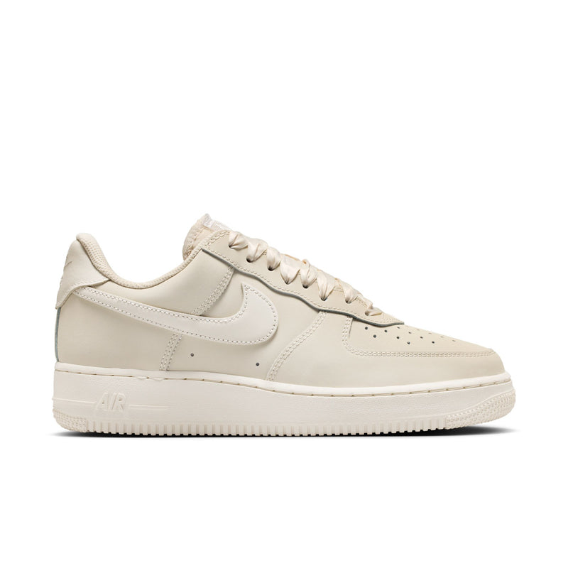 Women's Nike Air Force 1 low-top sneakers, light oatmeal upper with lace-up front